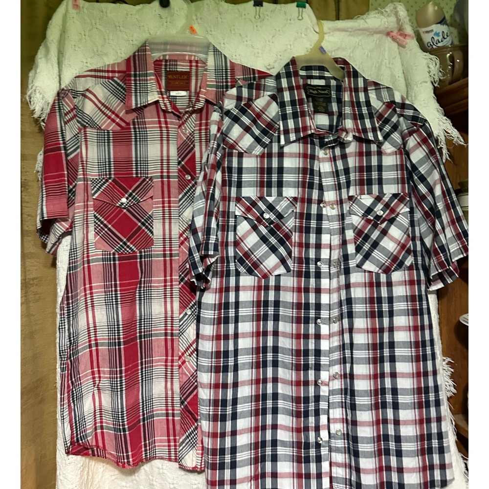 Two men's western pearl button short sleeve plaid shirts